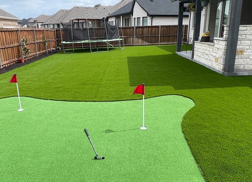 Custom backyard putting green installation in Dallas Fort Worth — EcoTurf Design & Build
